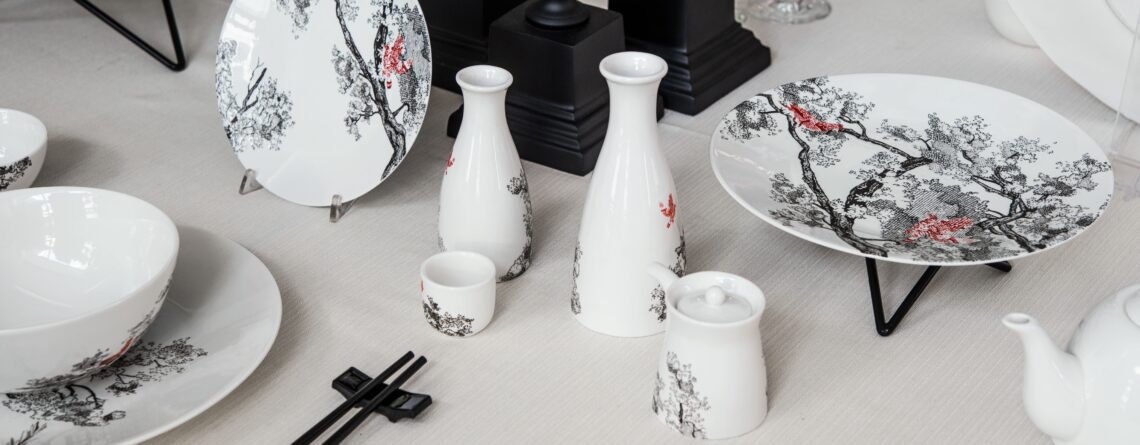 table setting with alumina porcelain collection Kerasia by Le Coq Porcelaine Ivory plates with oriental tree design